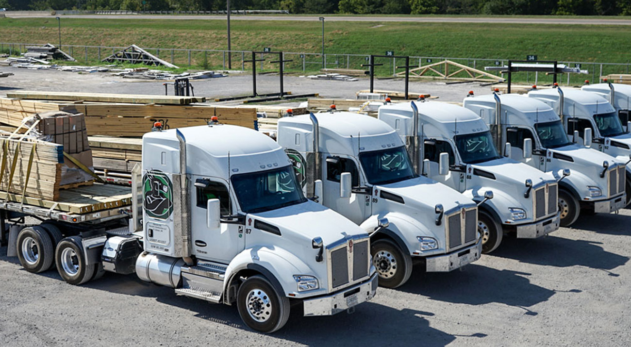 Burrows materials loaded on trucks