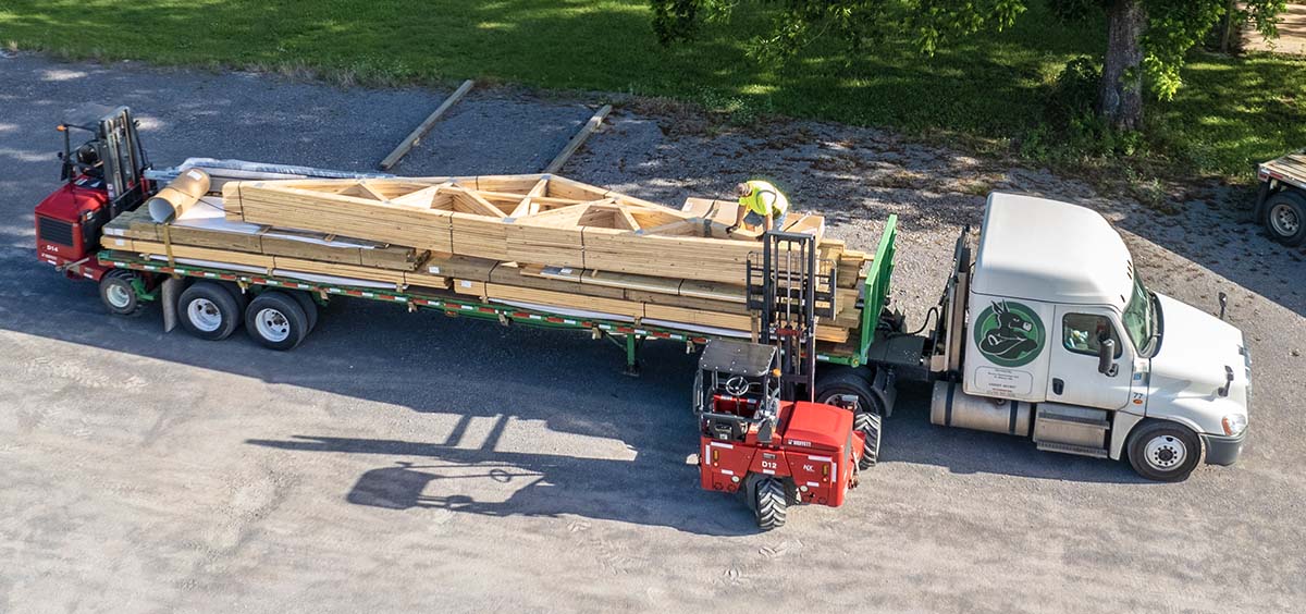 Burrows materials loaded on trucks